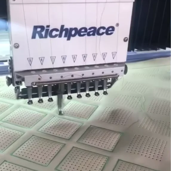 Richpeace Automatic leather perforation machine with sewing and embroidery functions for car seat cover