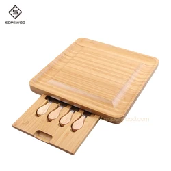 SOPEWOD 100% Natural Bamboo Cheese Board & Cutlery Set with Slide-Out Drawer and knife
