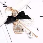 Alloy Pearl Pendant Factory Hot Sell Diamond Perfume Bottle Alloy Keychain Bowknot Pearl Pendant
