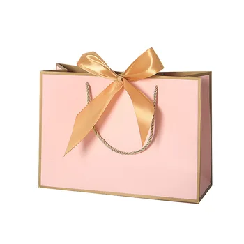Custom Logo Luxury Boutique Pink Wedding Gift Shopping Paper Bag With Ribbon and Handle For Clothing Packaging