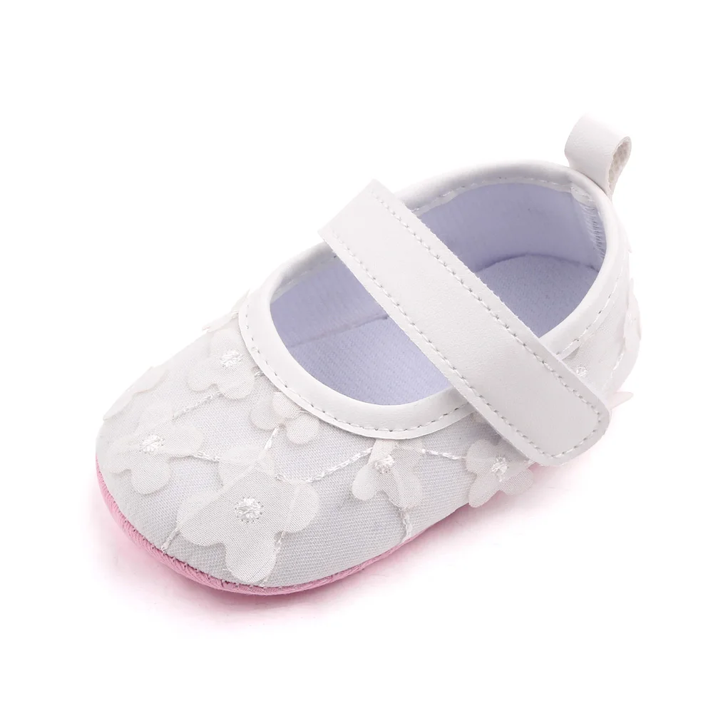 New Infants Cute Solid Color Small Flowers Indoor Soft Soled Toddler Shoes for Baby Girls supplier