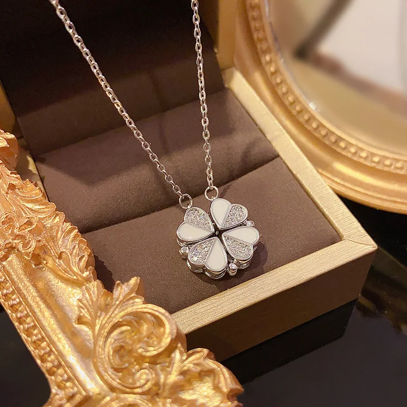 The Korean version of a two-wear flower light luxury niche high-grade design magnetic pendant titanium steel necklace