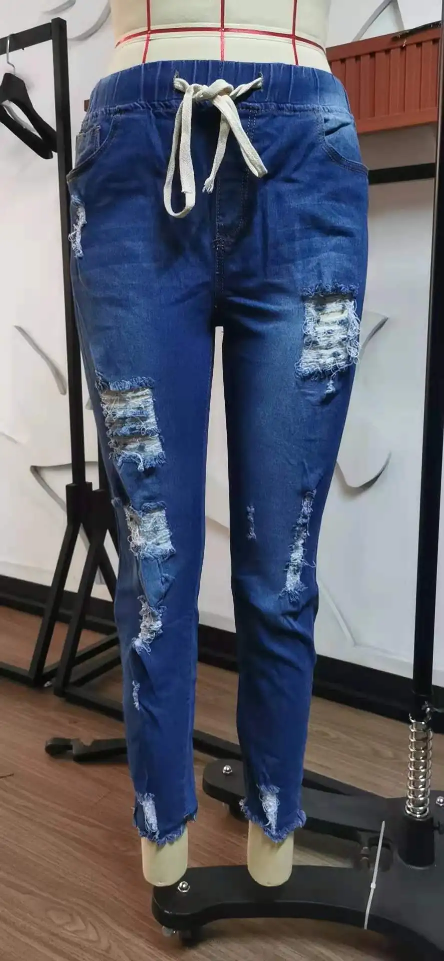 New Arrivals Plus Size Mid Waist Casual Washed Skinny Blue Denim Pencil Pants Ripped Distressed Women's Jeans factory