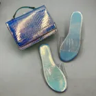Women Purses FANLOSN New Arrivals Laser Matching Slippers And Bag Box Bags Women Round Shape Bling Purses