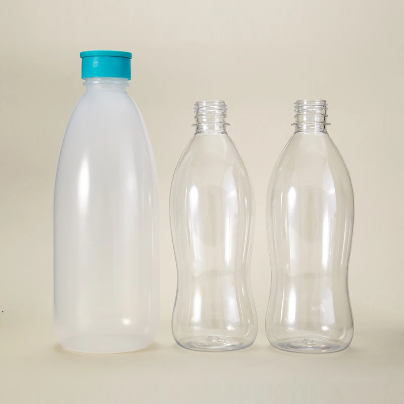 Wholesale Custom Logo Design Reusable 500 1000ml Transparent Sealed Sleek Small PET Plastic Juice Milk Bottles manufacture