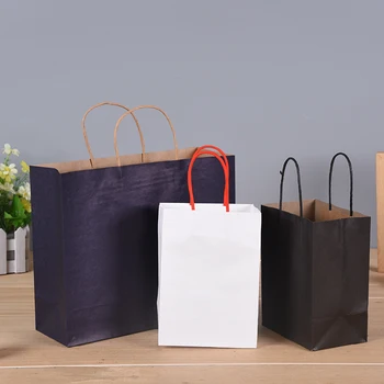 Classic white packing paper bag with red cotton handles for grocery and boutique