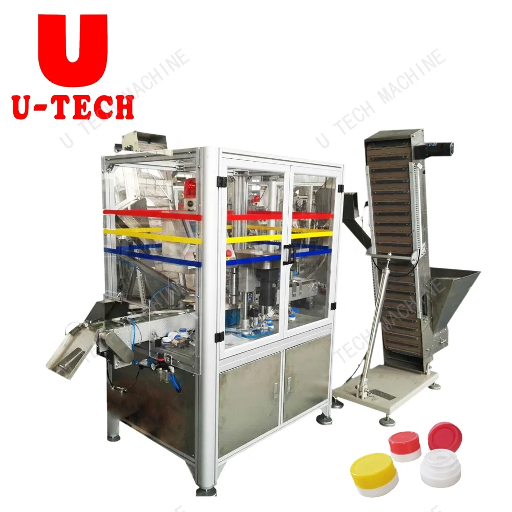 Cap assembly machine