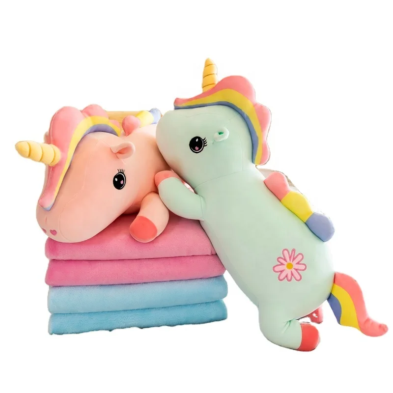 unicorn stuffed animal with blanket