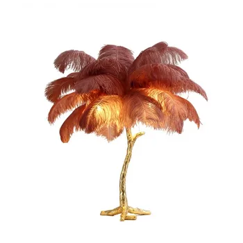 Stylish and romantic pink and white ostrich feather lampshade is suitable for indoor use as both a table and floor lamp.