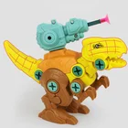 Children Disassemble And Assemble The Dinosaur Model Puzzle To Assemble The Building Block Toy