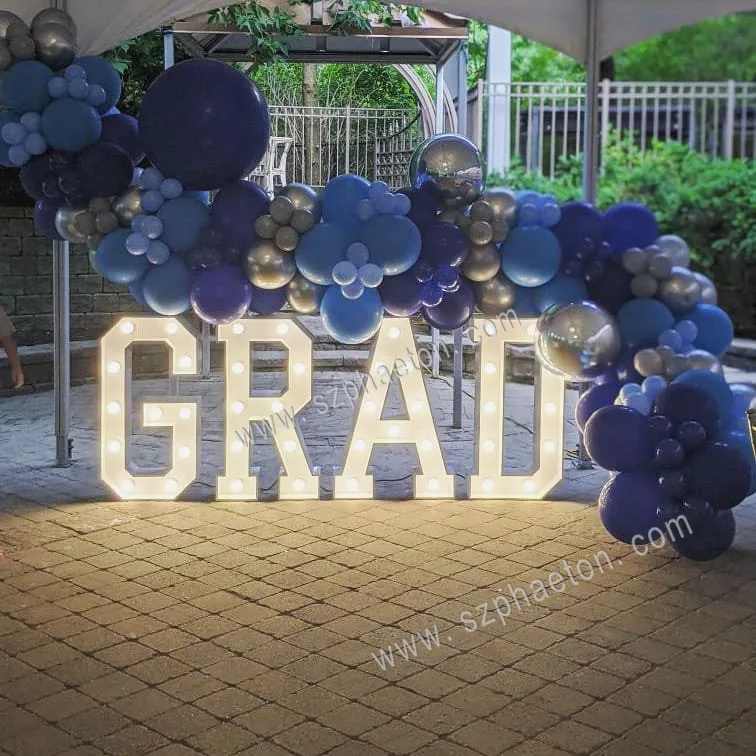 grad letters with lights