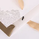 Luxury Gold Hot Stamping With Foil Length Handle Shopping Gift White Paper Bag