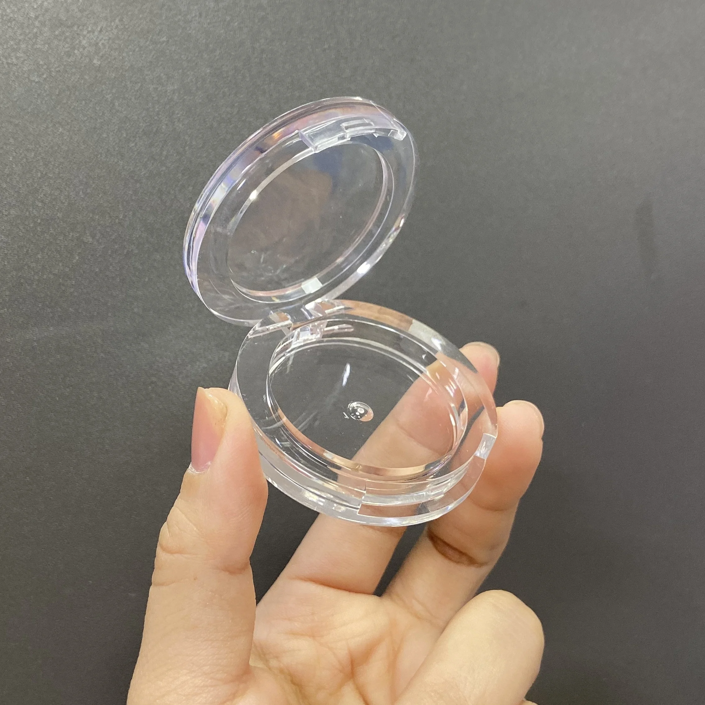 empty compact powder container