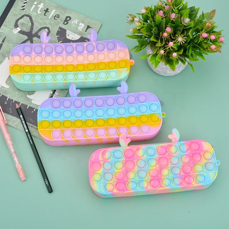 China factory press bubble pop small change purse antlers rainbow colorful silicone pencil case pop bag supplier