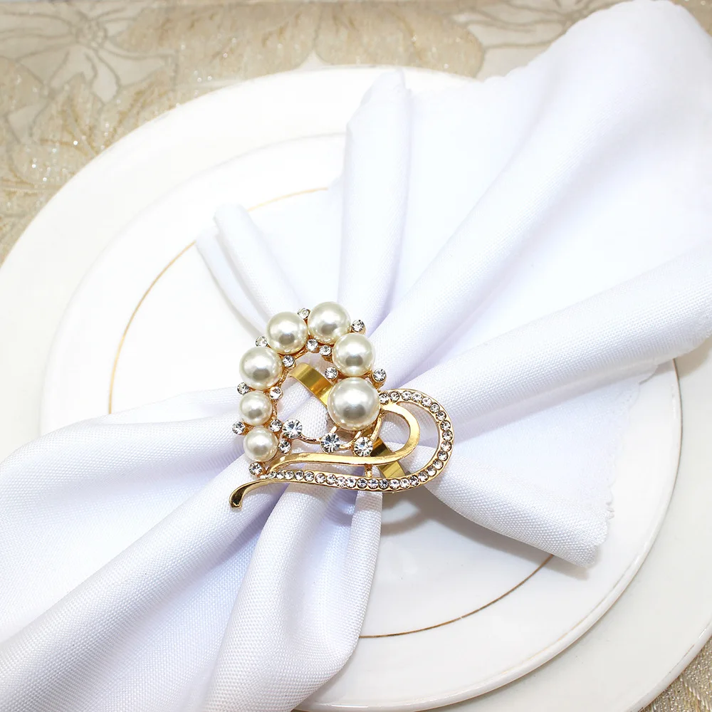 Pearl napkin rings (2)