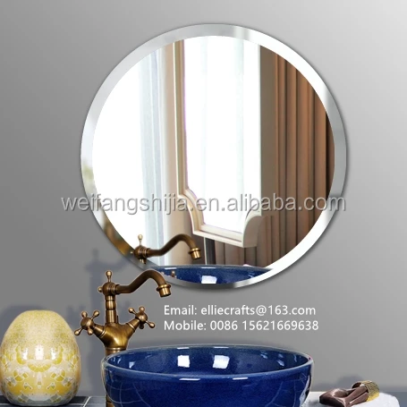 beveled round wall mirror