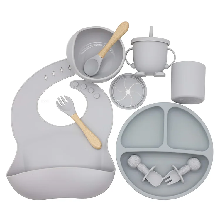 Wholesale BPA Free Baby Silicone Feeding Set Fork Spoon And Bibs USSE Suction Silicone Baby Feeding Set