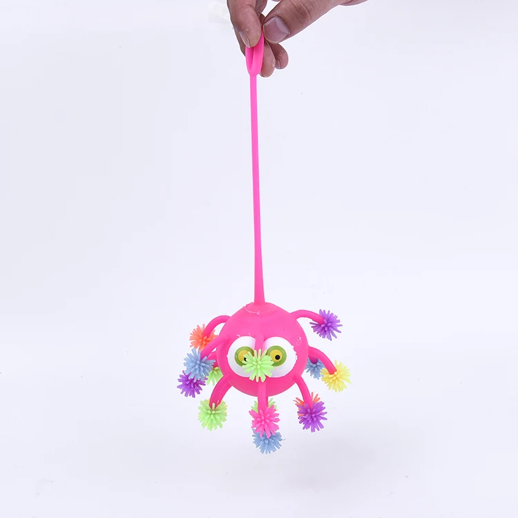 Supply Kids Toys Colorful Christmas Lighting Ball TPR Flashing Puffer Ball Toy With Big Eyes