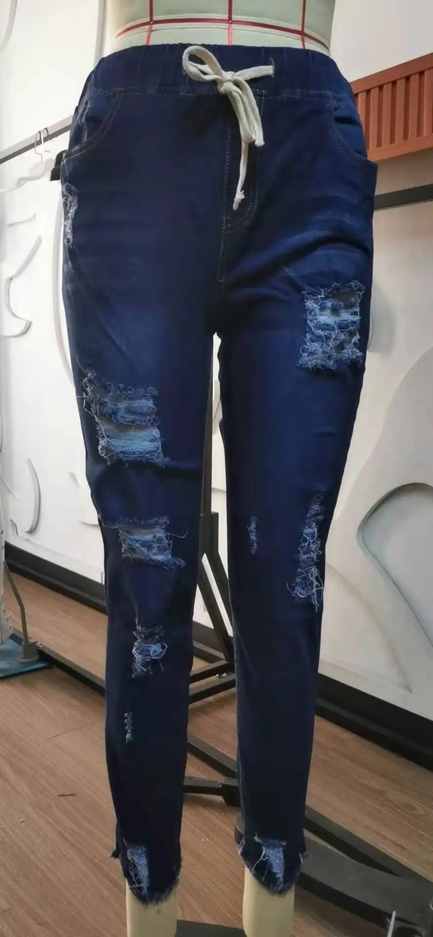 New Arrivals Plus Size Mid Waist Casual Washed Skinny Blue Denim Pencil Pants Ripped Distressed Women's Jeans supplier