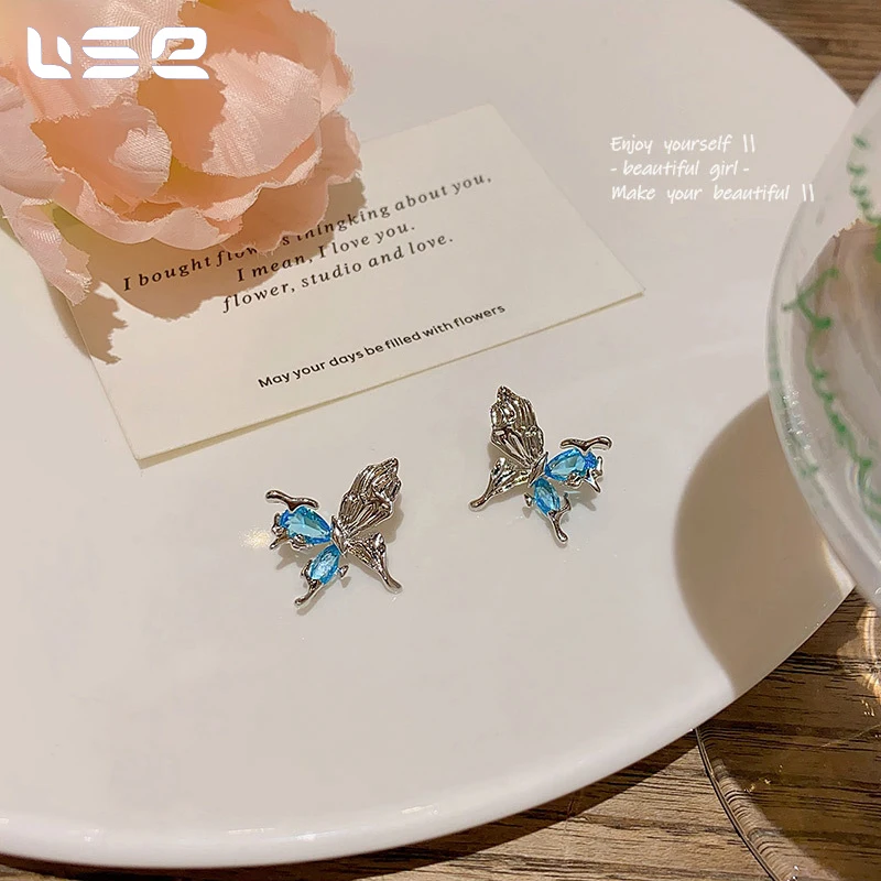 High quality fashion exquisite advanced design sense copper blue zircon butterfly earrings for women