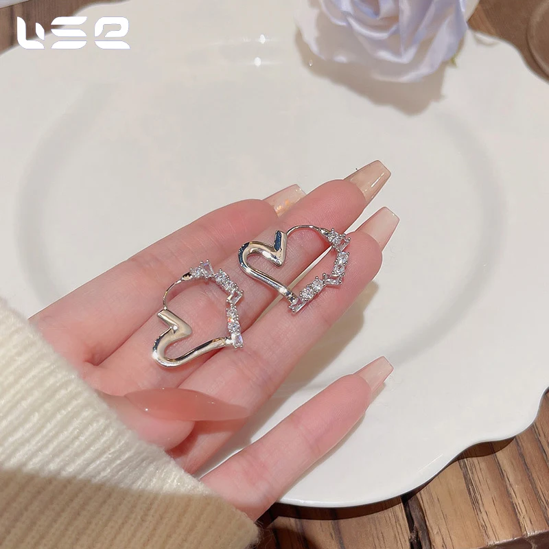 New Korean fashion niche personalized copper zircon hollow out heart earrings jewelry for women