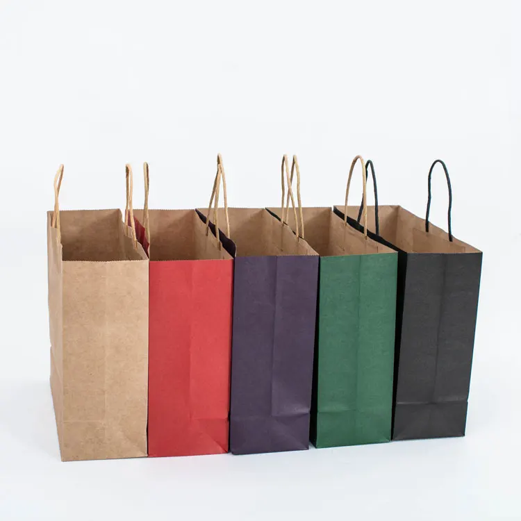 brown paper shopping bolsas with handles