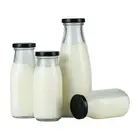 Recycled Bottle Wholesale Eco-friendly Recycled Clear Glass Milk Bottle With Cap 200ml 250ml 300ml 500ml
