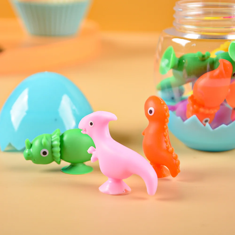 Food grade silicone small dinosaur toy set molar rod decompression suction cup toy