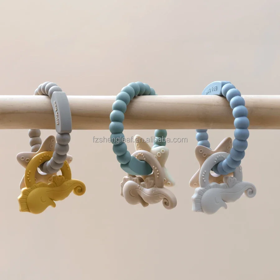 product cartoon shaped food grade bpa free custom silicone baby teether soft toy pacifier ring unisex customized teething aids-1