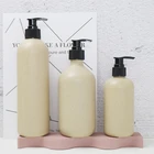 Biodegradable cosmetic container 500ml wheat straw PET plastic shampoo pump bottle with black pump lid