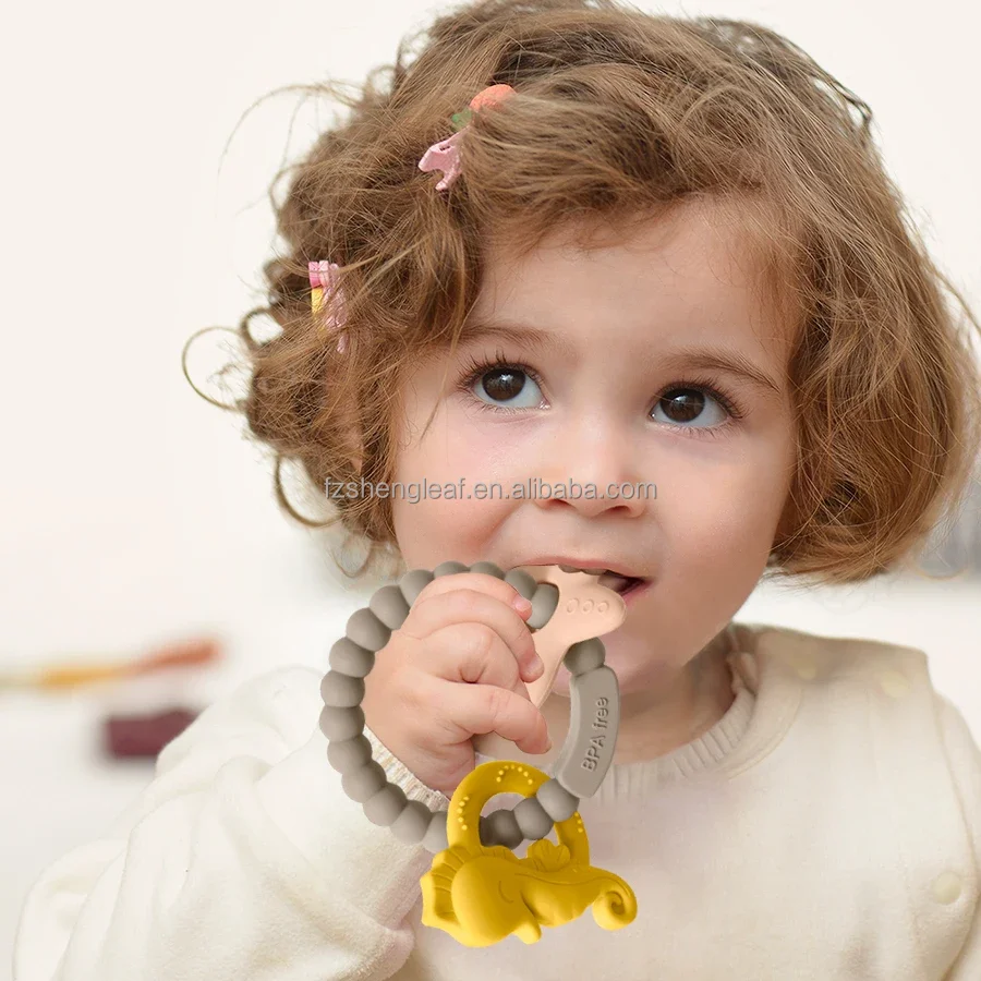 product cartoon shaped food grade bpa free custom silicone baby teether soft toy pacifier ring unisex customized teething aids-5