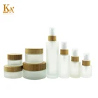 100ml 120ml Glass Bottle 30ml 50ml 100ml 120ml Cylinder Shape Frosted Clear Bamboo Lotion Glass Pump Bottle