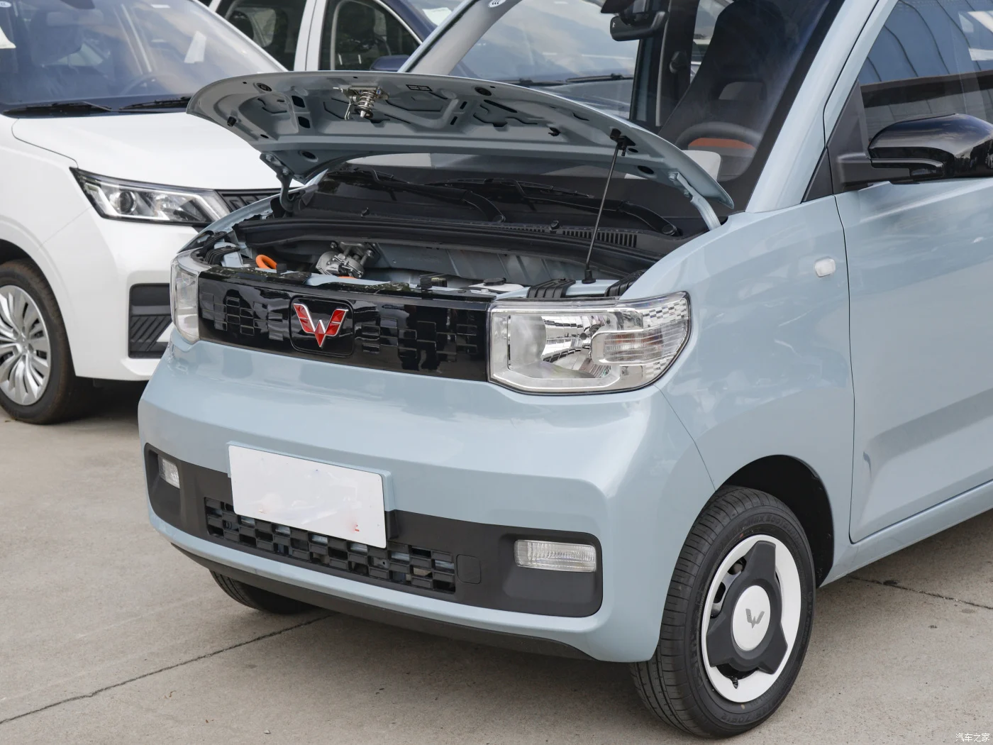 Wuling Hongguang Airbag Mini Ev 100km H 4 Seats Lithium Battery Smart