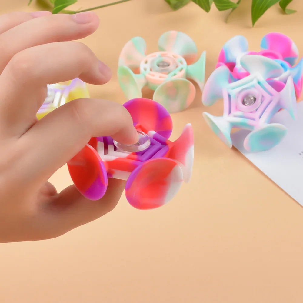 Colorful suction dart fidget toys silicone snowflake flower round shape finger spinner stress relief toys