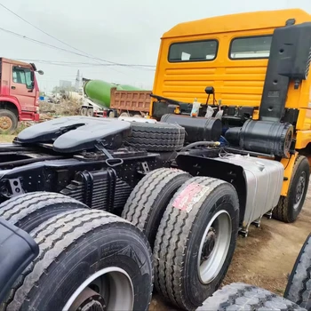 shacman  truck   tractor truck   6*4   10 tires    orange colour   head   heavy truck   right driving