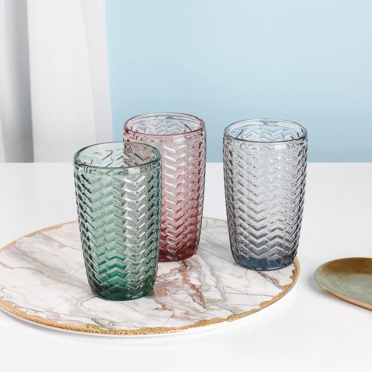 Fashion design hot selling wine juice beer glass cups embossed pattern wholesales drinking glass cups