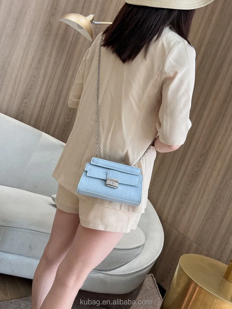 alligator embossed handbag