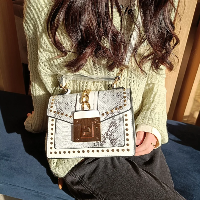 snakeskin designer handbags