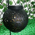 Product Solar Outdoor New Product Sun Face Openwork Pattern Metal Solar Lanterns For Garden Lawn Decoration
