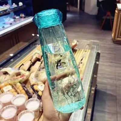 Crystal Infused Gem Water Bottle Wellness 500ml Glass water bottle wholesale Coloured stone glass water bottle