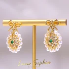 Green Earrings Wholesale Exquisite Gilded Note Natural Pearl Bow Circle Green Stone Jewelry Stud Earrings