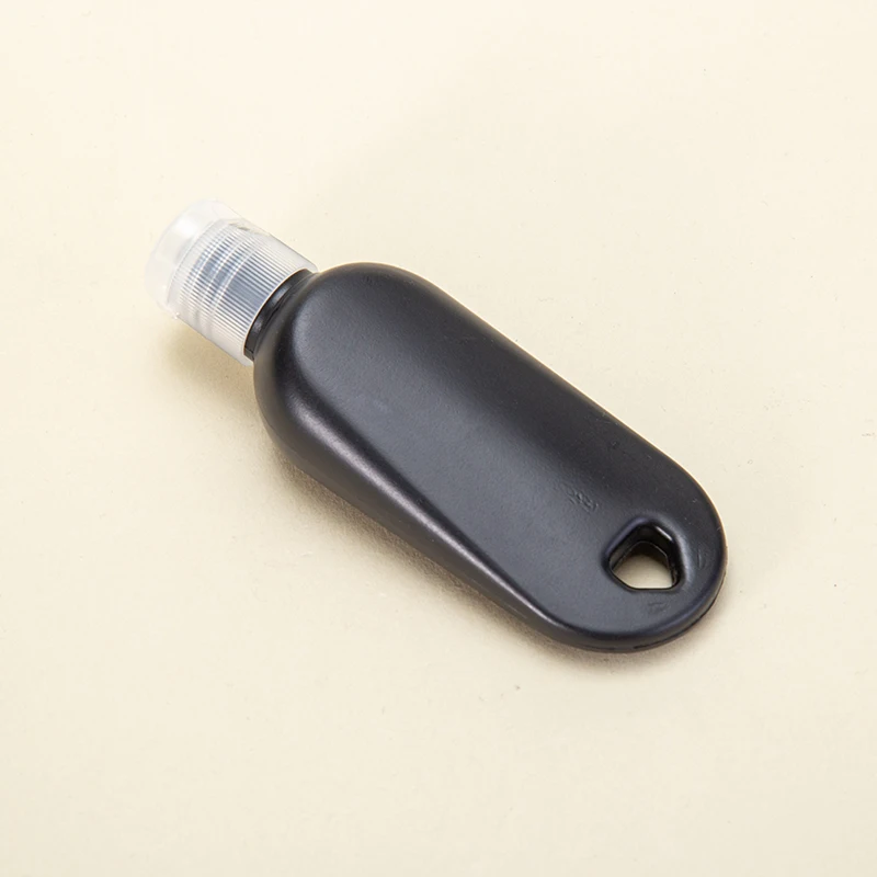 Refillable Empty Containers Flip Lid Travel 30 50 60 100 ml Plastic Squeeze Bottles With Keychain Hook factory