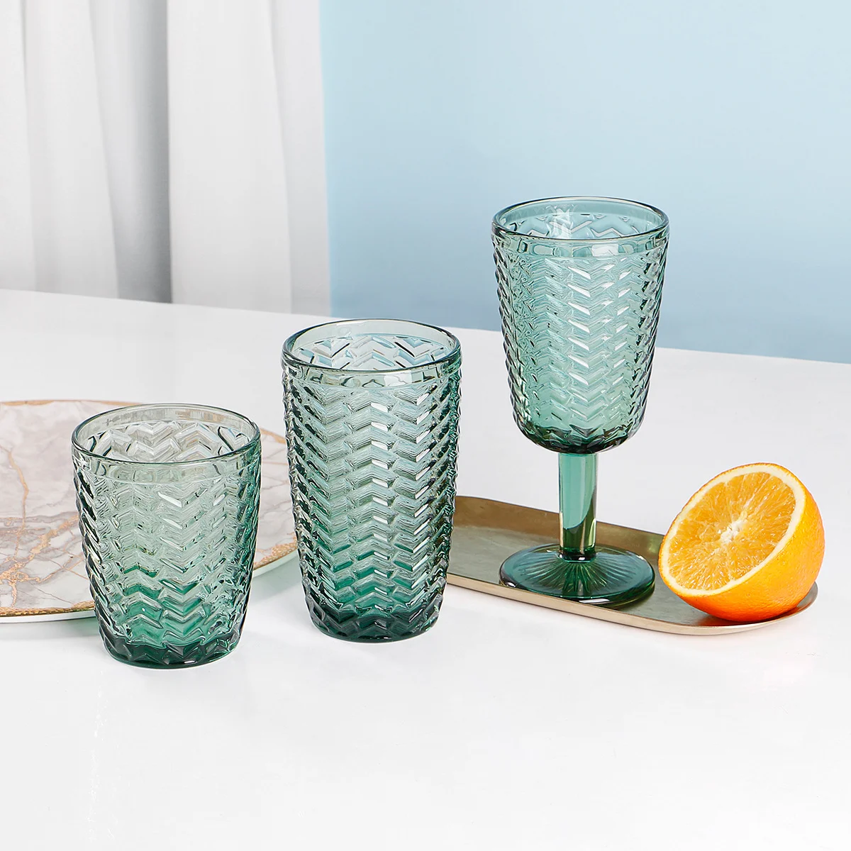 Fashion design hot selling wine juice beer glass cups embossed pattern wholesales drinking glass cups