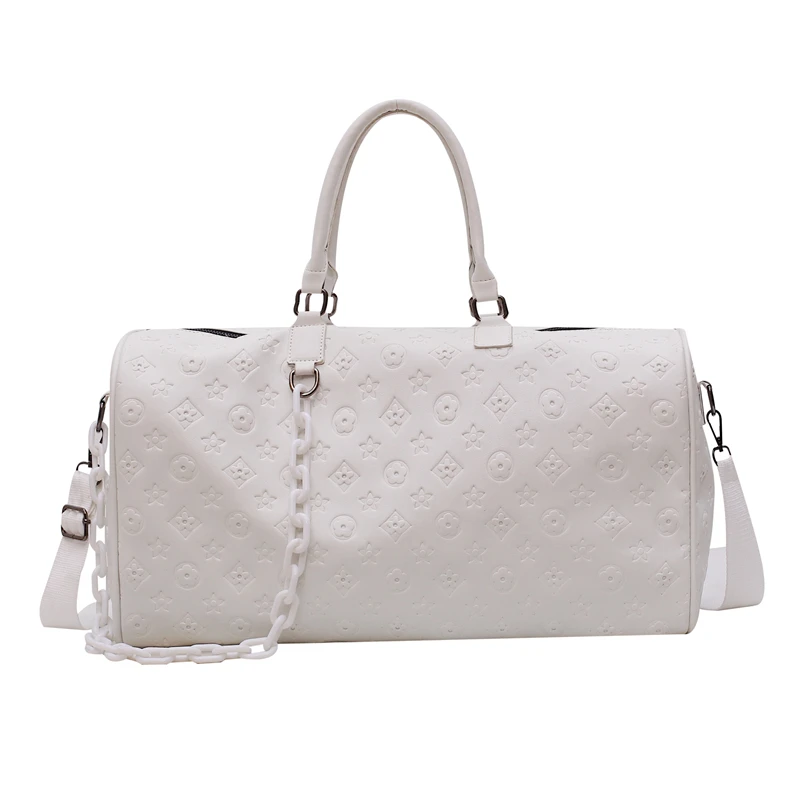 white leather duffle bag