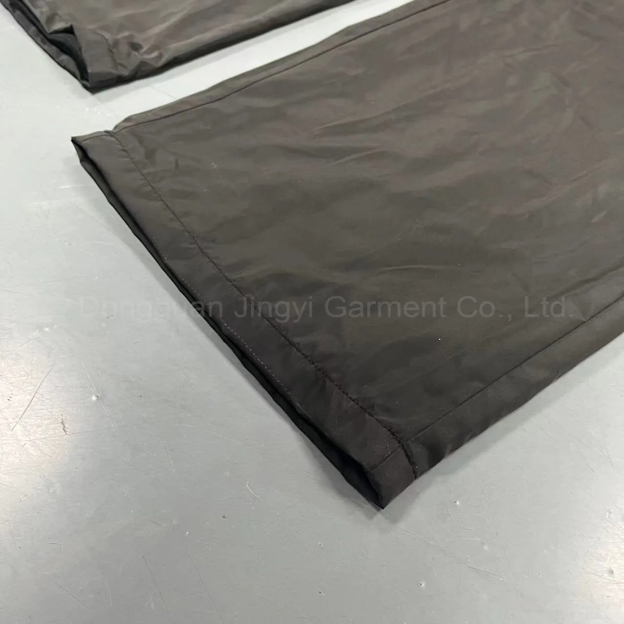 Dongguan Manufacturer Custom Casual Waterproof Outdoors Windbreaker Polyester Trousers Blank Embroidery Nylon Track Pants Men supplier