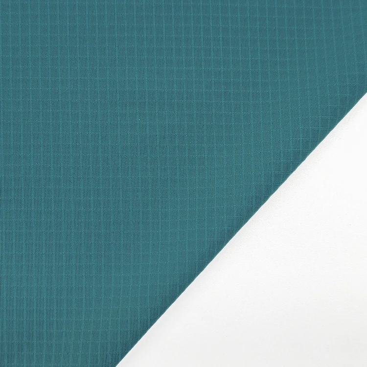 Factory Direct Sale Knit Fabric 73 Nylon 27 Spandex Material Check Interlock Fabric for Sportswear details