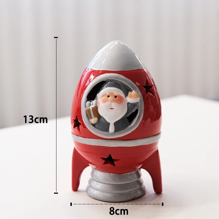 Factory OEM ceramic christmas rocket with snowman figurine ornaments