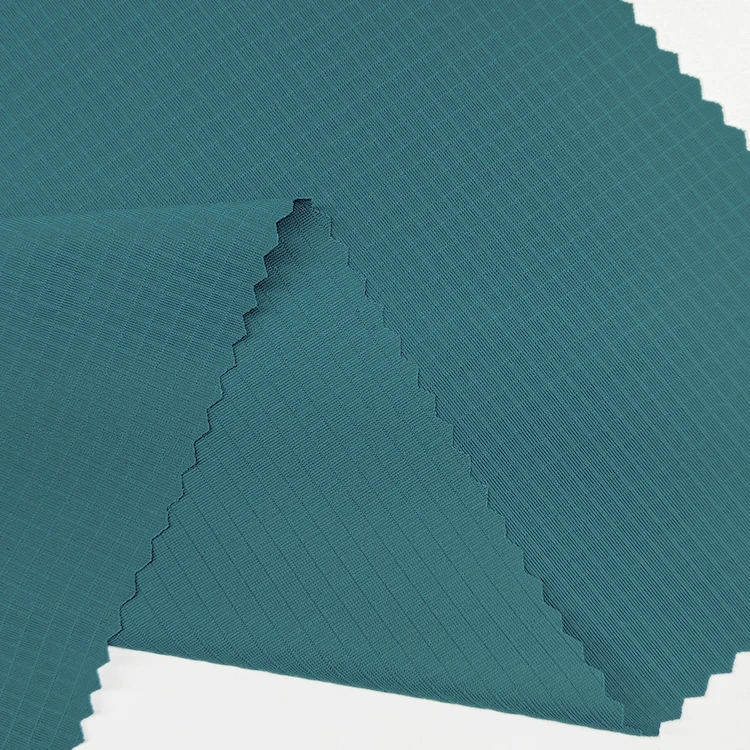 Factory Direct Sale Knit Fabric 73 Nylon 27 Spandex Material Check Interlock Fabric for Sportswear supplier