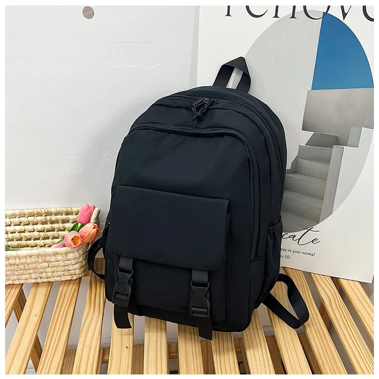 Wholesale solid color backpack simple waterproof lightweight student bag unisex suitable for travel fitness sports outdoor