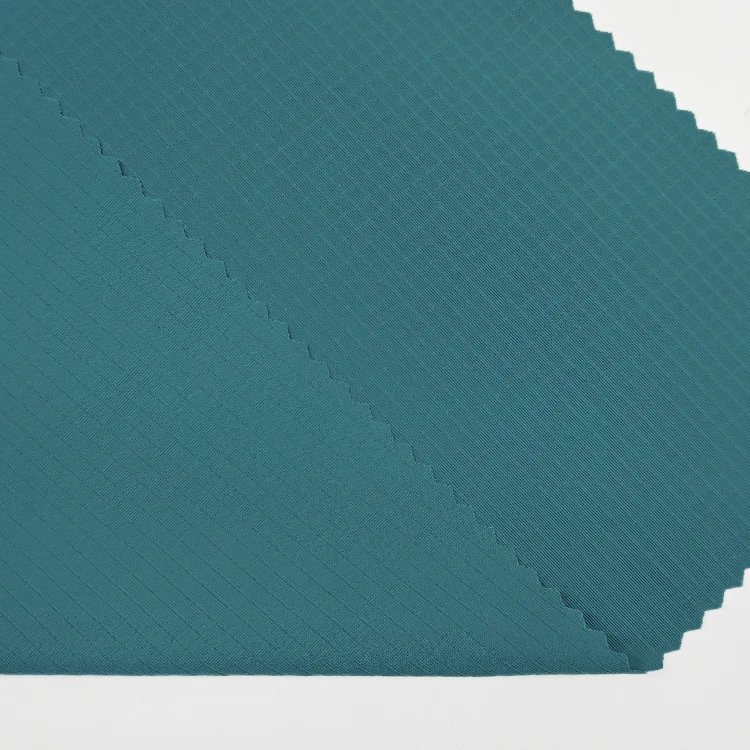 Factory Direct Sale Knit Fabric 73 Nylon 27 Spandex Material Check Interlock Fabric for Sportswear details